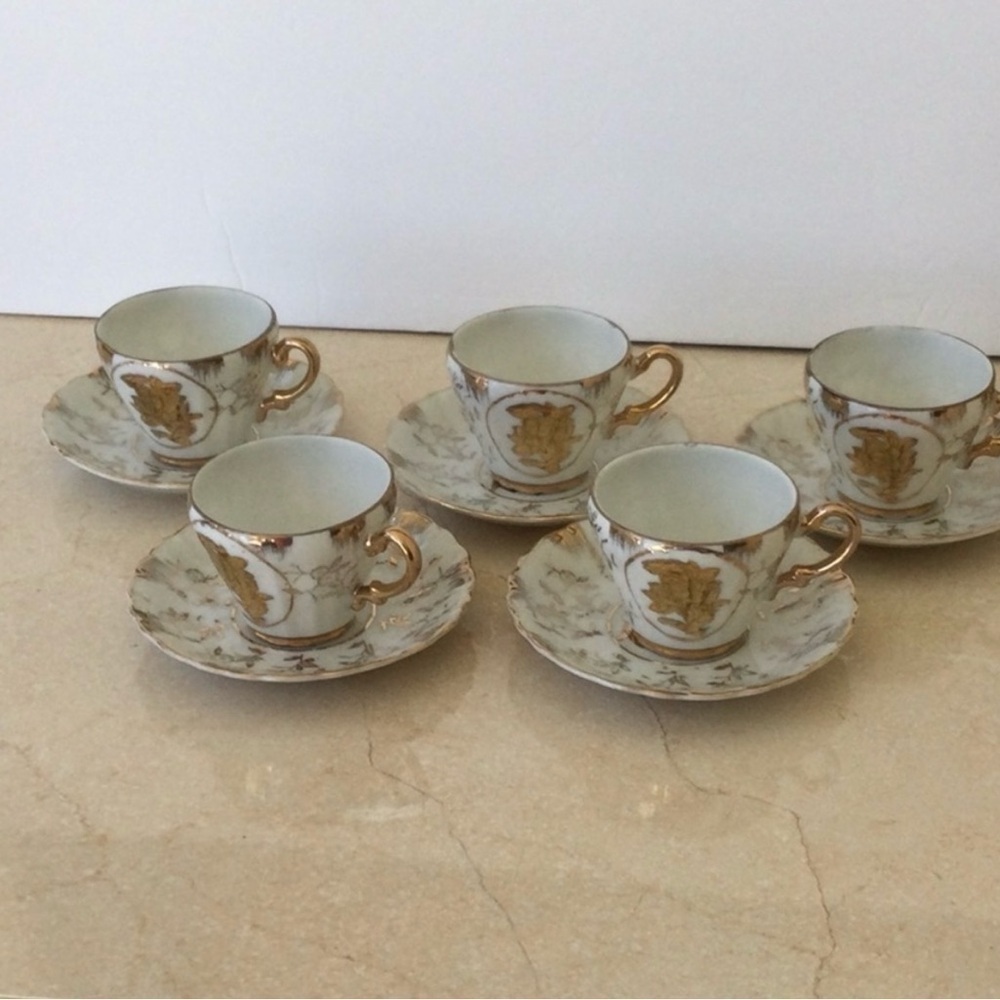 Vintage Sterling China Japan Porcelain 5 Demitasse cups and saucers. .  ##